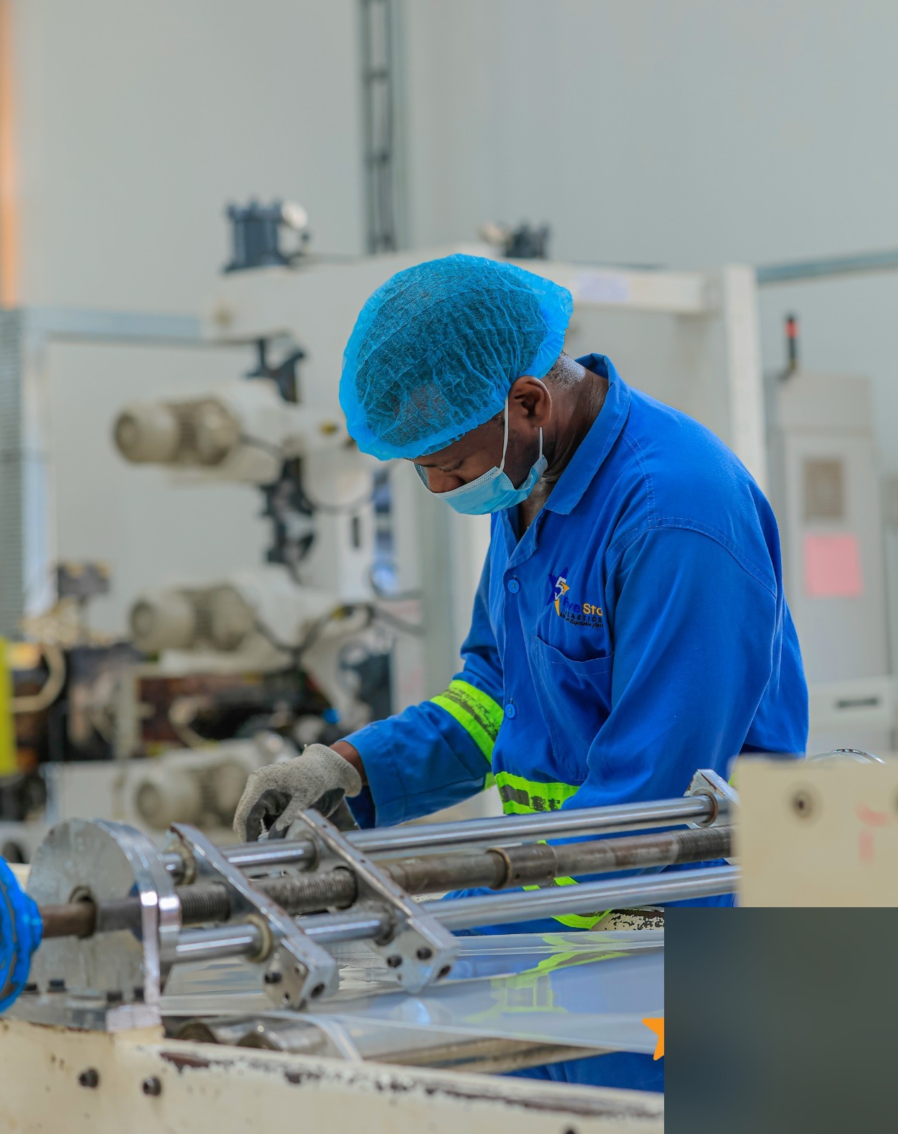 Plastic extrusion machine on the Five Star Plastics production floor